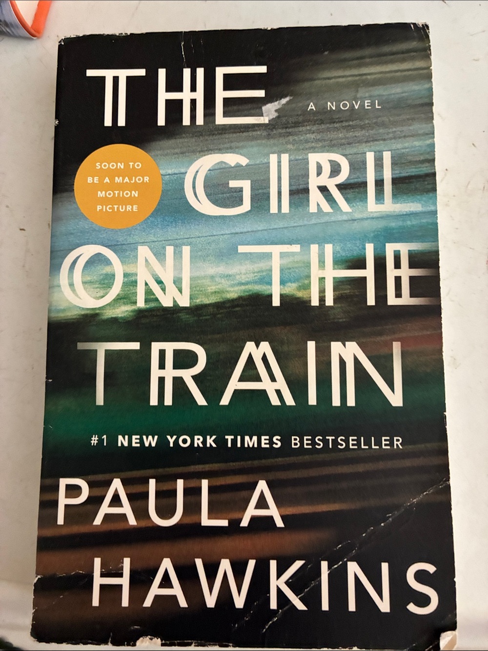 The Girl on the Train by Paula Hawkins - Teal & Black Cover